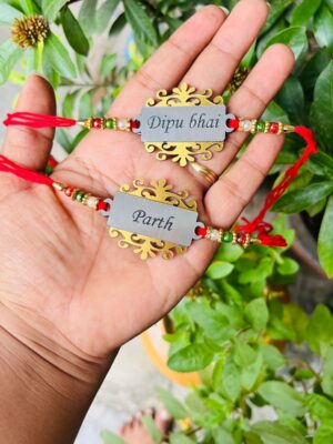 Acrylic Foil Rakhi with Border