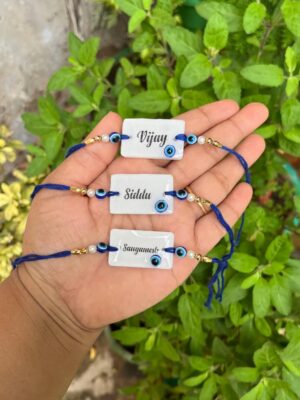 Resin Evil Eye Name Rakhi | Inspiring Indians